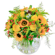 Radiating summertime brilliance, this bouquet from a Sipson florist channels the golden warmth and easy joy of local meadows into one uplifting arrangement. At its core, sunflowers beam with confidence, their dark chocolate centres ringed by petals that echo the sunshine over Sipson Rec. Tucked closely are creamy yellow roses, each swirl of petal unfolding with gentle promise. Accents of fiery orange blooms and clusters of glossy red berries create vibrant contrasts-like colourful highlights along Old Bath Road. Fine ferns and fragrant greenery burst outward, giving a fresh, lively energy and the sense of a wild bouquet freshly gathered from the countryside. Nestled in a rounded glass vase, the stems criss-cross elegantly in clear water, lending openness and natural grace to the overall look. Upon entering a home in Sipson, the bouquet brings a soft, sweet scent and an aura of happiness-an ideal gift for birthdays, heartfelt thanks, or simply sharing gentle sunshine with someone close by. Crafted with local flair and careful attention, this bouquet is a sensory embrace, turning any day into a warm celebration.